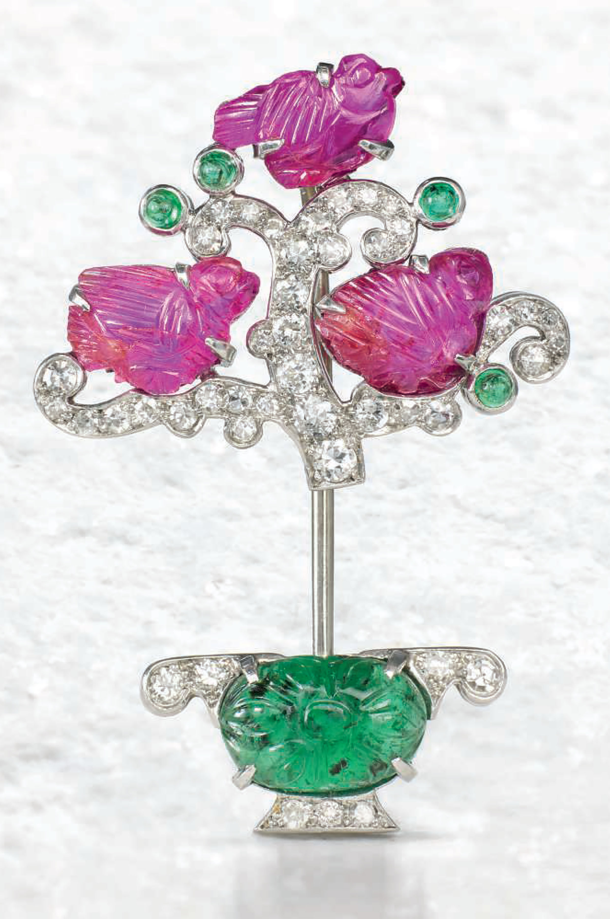 An Art Deco ‘Tutti Frutti’ jabot pin, by Cartier, circa 1925. Sold for £40,000 on 13 June 2017 at Christie’s in London
