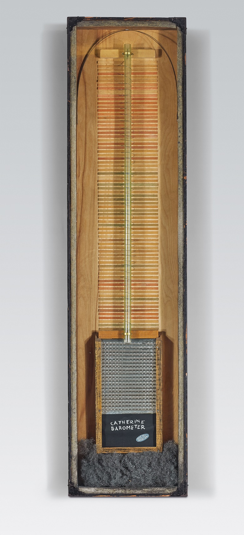 Man Ray (1890-1976), Catherine Barometer, 1920; unique. Wood box assemblage with glass, metal brackets, felt, metal washboard, tube, wire, coloured wood, gouache on black paper, paper stamp and steel wool. Height 48⅛ in (122.2 cm). Sold for $3,252,500 on 13 November 2017 at Christie’s in New York