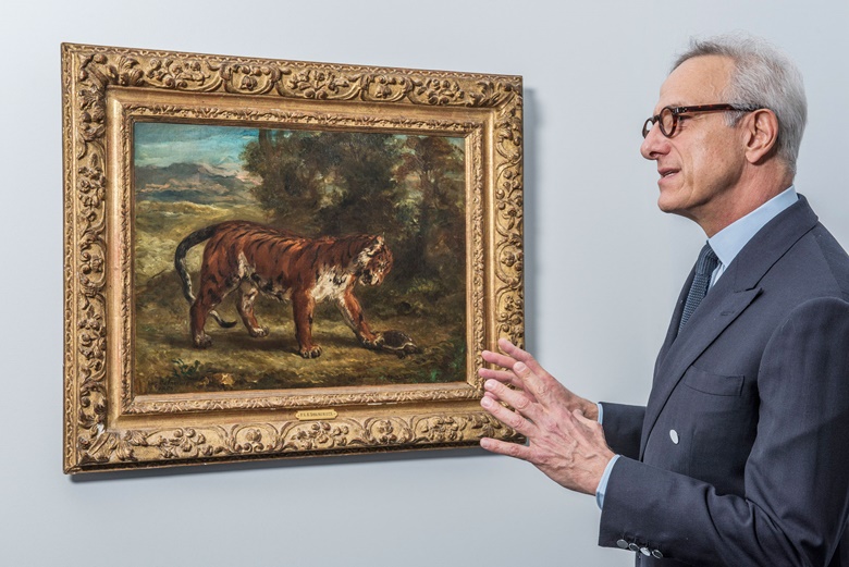 François de Ricqlès, President of Christie’s France with Eugène Delacroixs (1798-1863), Tigre jouant avec une tortue, 1862. Oil on canvas. 17¾ × 24½ in (45.1 × 62.2 cm). Estimate $5,000,000-7,000,000. This lot is offered in The Collection of David and Peggy Rockefeller 19th & 20th Century Art, Evening Sale on 8 May at