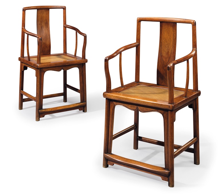 A pair of Huanghuali southern officials hat armchairs, Nanguanmaoyi, 17th century. 37? in (95.3  cm) high, 20?  in (52.1  cm) wide, 16?  in (41.3  cm) deep. Sold for $125,000 on 22-23 March 2018 at Christie’s in New York