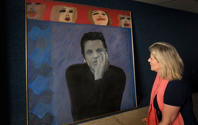 Rachel Hidderley, Christie’s Senior Director of Modern British art, with Pauline Boty’s Portrait of Derek Marlowe with Unknown Ladies