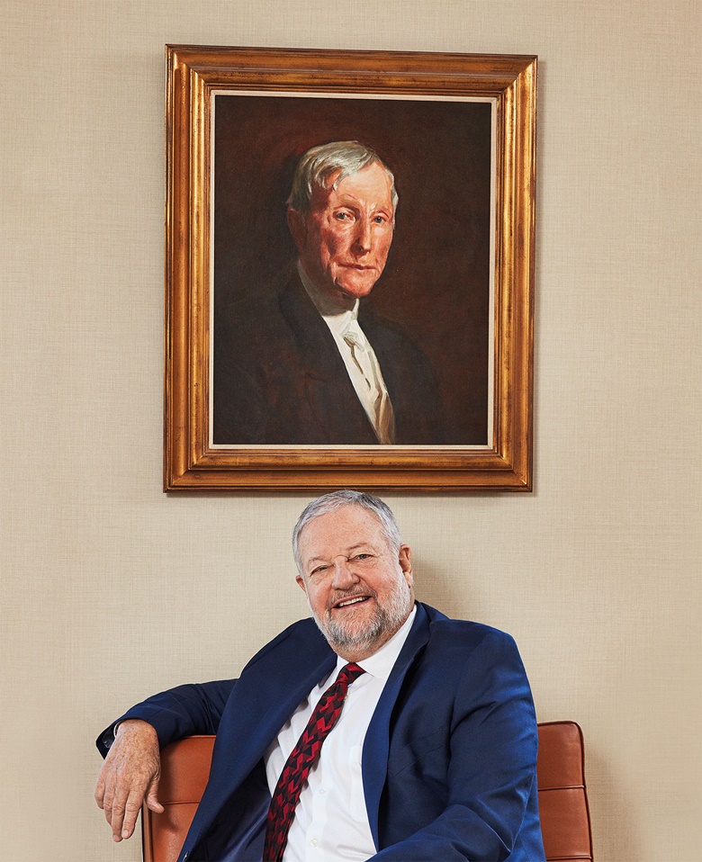 David Rockefeller, Jr. in front of a portrait of his great-grandfather John D. Rockefeller. Sr., by John Singer Sargent (private collection). Photo Christopher Sturman