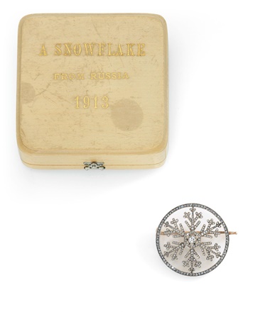 A very rare diamond and rock crystal silver-topped gold-mounted ‘snowflake’ brooch, Fabergé circa 1913. 1⅛  in (2.9  cm) diameter. Sold for £112,500 on 27 November 2017 at Christie’s in London