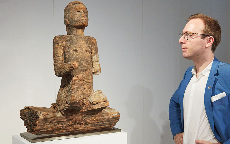 Bruno Claessens with the Durand-Dessert Mbembe figure from Nigeria, sold for €1,927,500 on 27 June 2018 at Christie’s in Paris