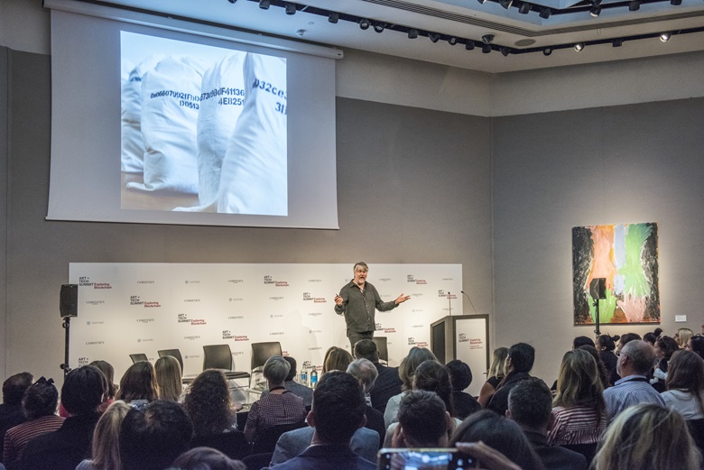 Conceptual artist Kevin Abosch addresses delegates at the conference