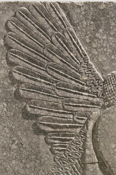 The wings of the apkullu, or genius, are exquisitely detailed