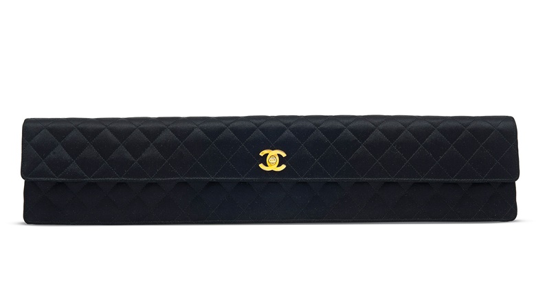 Why Collectors Love Chanel Handbags Christie S A Rare Extra Long East West Black Satin Flap Clutch With Gold Hardware Chanel