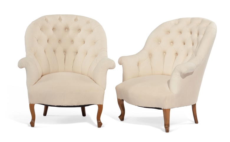 A pair of plain slipper chairs are transformed with the addition of slipcovers, pictured right