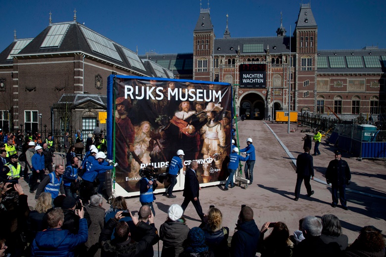 The Night Watch is drawn through the streets of Amsterdam ahead of the reopening of the Rijksmuseum in March 2013. Photo AP PhotoPeter DejongRexShutterstock