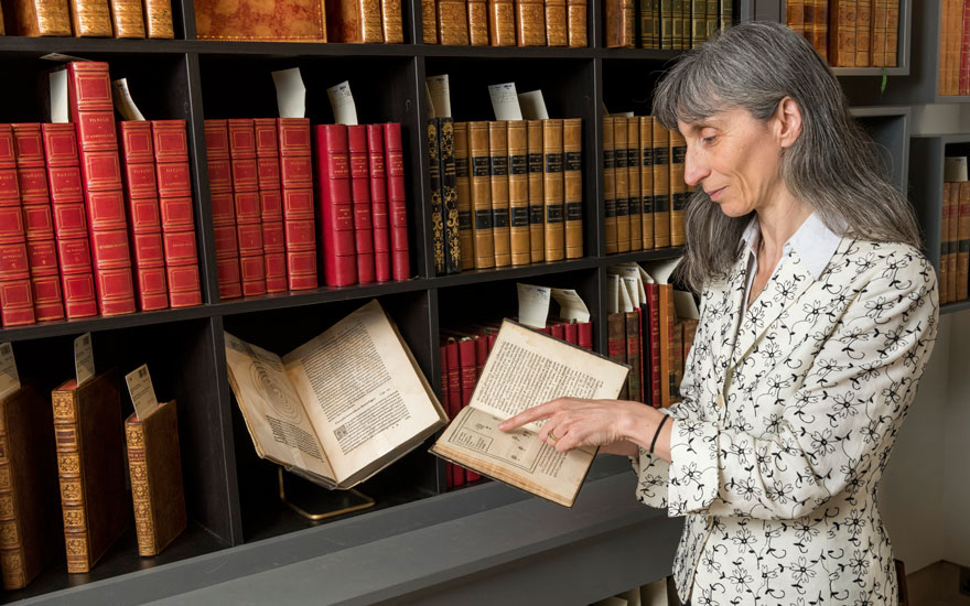 Barbara Scalvini with a first edition of Tycho Brahe’s De nova… stella. Offered in Important Scientific Books from the Collection of Peter and Margarethe Braune on 9 July 2019 at