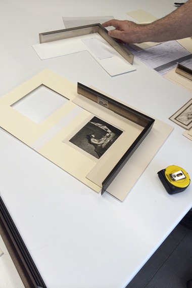 Considering frame options. © John Jones London
