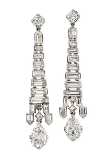 Art Deco diamond earrings. Circular, pear and baguette-cut diamonds, later post fittings, 5.2 cm, red fitted case. Sold for £46,250 on 27 November 2019 at Christie’s in London