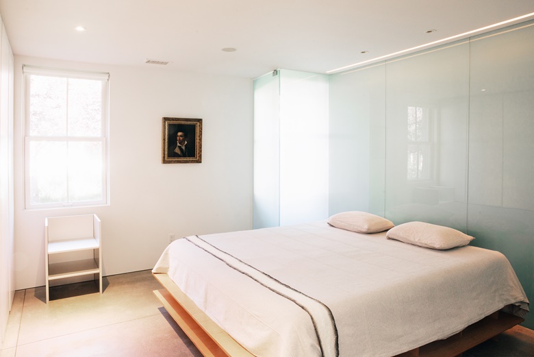 A Donald Judd chair and a portrait attributed to the school of Pierre-Paul Prud’hon in the bedroom. Artwork © Judd FoundationARS, NY and DACS, London 2020