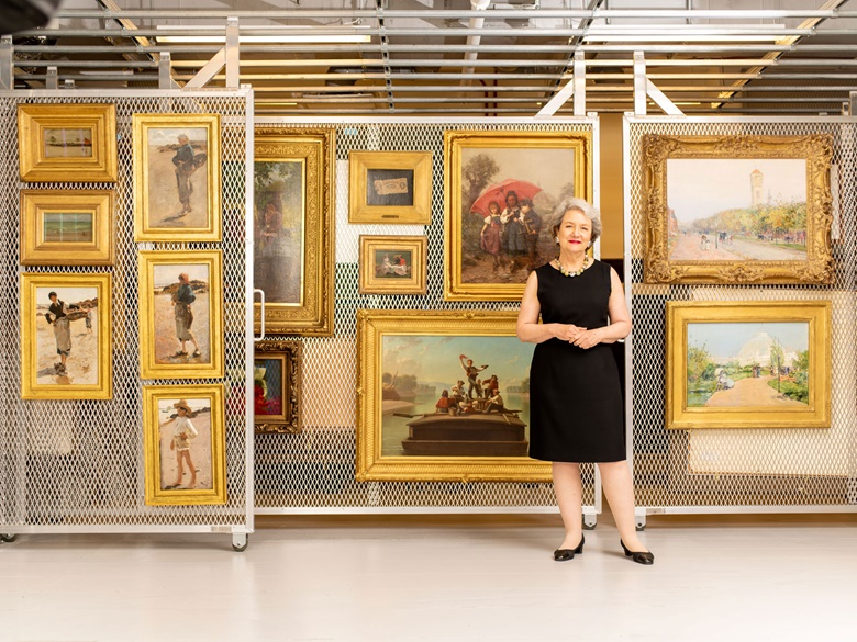 The foundation’s president and CEO Elizabeth Glassman with 19th-century works owned by the Terra Foundation. Photograph David Kasnic