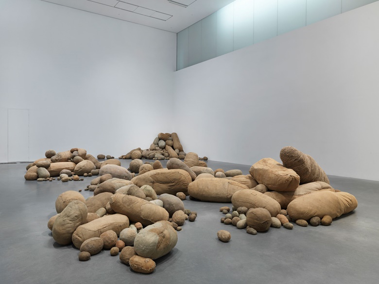 Installation view of Embryology, 1970-80, at Magdalena Abakanowicz Every Tangle of Thread and Rope, Tate Modern, London (until 21 May 2023). Tate Collection. © Magdalena Abakanowicz Foundation