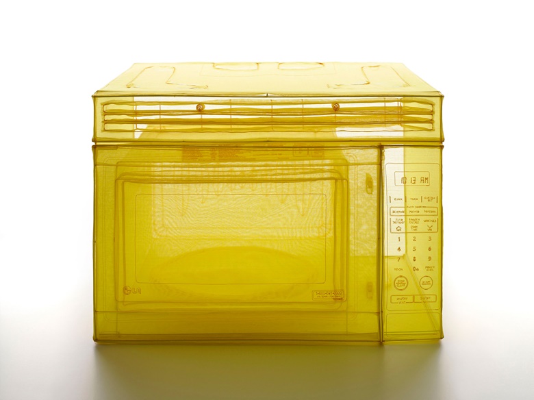 Do Ho Suh, Microwave Oven, Unit 2, 348 West 22nd Street, New York, NY 10011, USA, 2015. Polyester fabric, stainless-steel wire, and glass display case with LED lighting. 29.92 x 36.22 x 26.38 in (vitrine) (76 x 92 x 67 cm). © Do Ho Suh. Courtesy the artist and Lehmann Maupin, New York, Seoul and Hong Kong