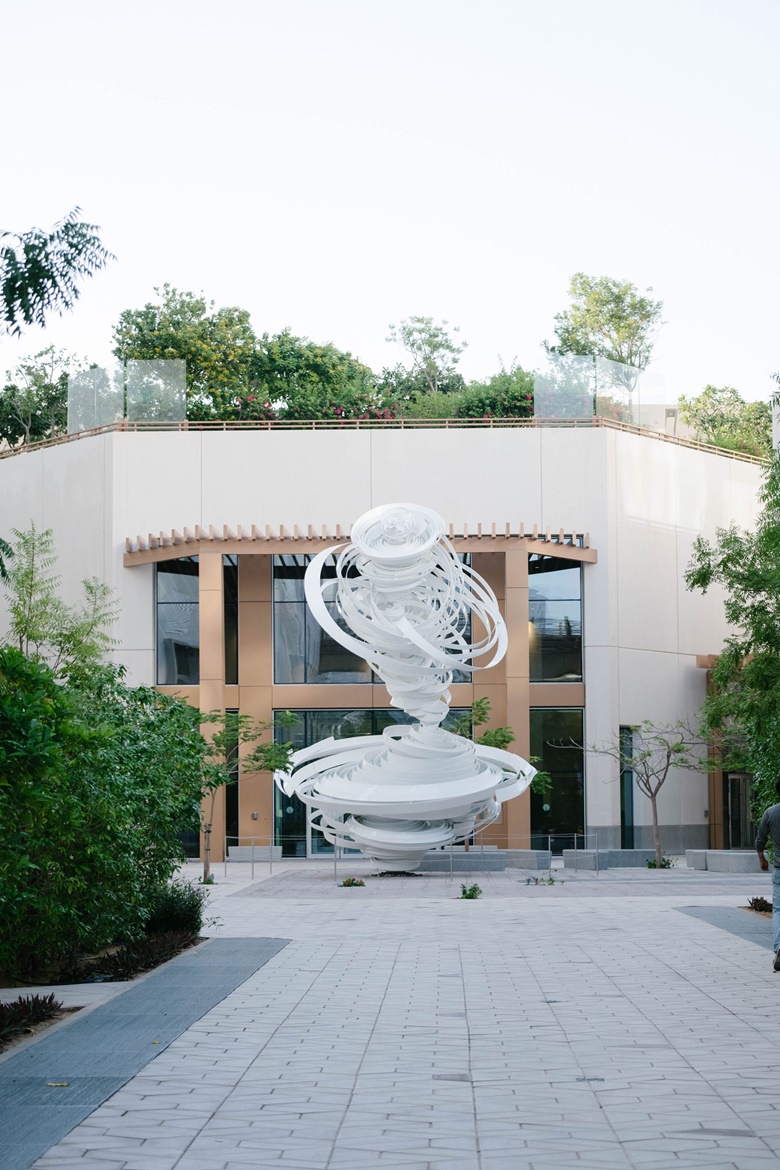 The NYUAD campus where artworks include Alice Aycock’s sculpture Whirlabout (Dynamo). Photo Anna Nielsen. Artwork © Alice Aycock, courtesy Marlborough Gallery, New York