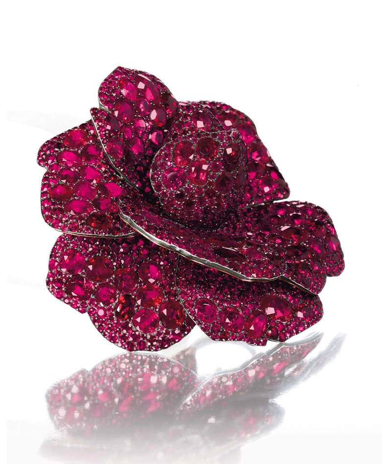 A ruby flower brooch, by JAR. Sold for CHF 4,003,000 on 14 May 2012 at Christie’s in Geneva