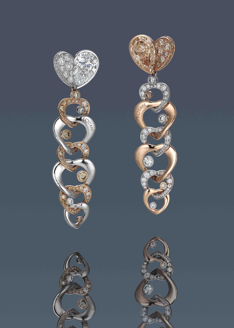 A pair of fancy colour diamond and diamond earrings designed by Anna Hu. Estimate HK$200,000-300,000. Offered in Diamonds that Care, 3-13 July 2020, Online