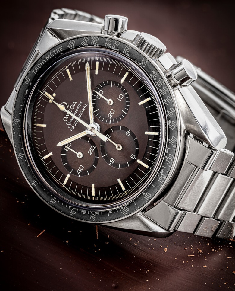 欧米茄，不锈钢链带腕表，配计时功能及热带棕色表盘， “SPEEDMASTER” ，型号145022-69 ST，约1970年制。估价：120,000-180,000港元。此拍品将于2020年7月13日佳士得香港精致名表呈献
