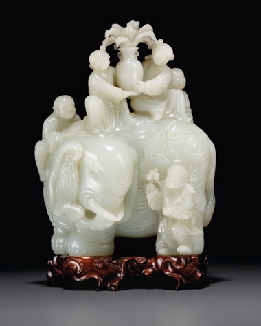A large and finely carved white jade ‘elephant and boys’ group, Qianlong period (1736-1795). 7½  in (19  cm) high. Estimate $500,000-800,000. Offered in Important Chinese Ceramics and Works of Art  on 25 September 2020 at Christie’s in New York
