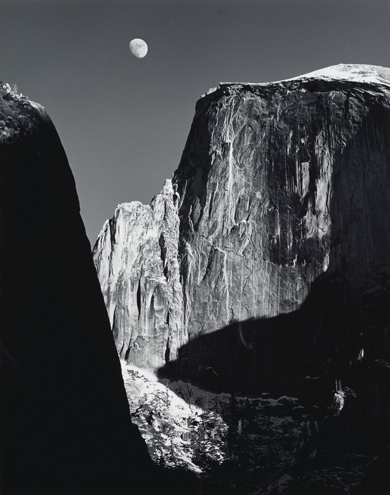 Ansel Adams (1902-1984), Moon and Half Dome, Yosemite National Park, California, 1960. Gelatin silver print, mounted on board, printed 1962. Imagesheet 13¼ x 10½  in (33.6 x 26.6 cm); mount 18 x 14 in (45.7 x 35.5 cm). Estimate $30,000-50,000. Offered in Ansel Adams and the American West, 25 March-8 April, Online