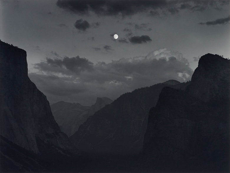 Ansel Adams (1902–1984), Yosemite Valley, Moonrise, Yosemite National Park, California, c. 1935. Gelatin silver print, mounted on board, printed 1973-1977. Imagesheet 10 x 13⅜ in (25.4 x 33.9 cm); mount 16 x 20 in (20.6 x 50.8 cm). Estimate $8,000-10,000. Offered in  Ansel Adams and the American West, 25 March-8 April, Online