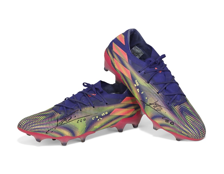 Game-worn Adidas Nemeziz Messi 19.1, each boot signed ‘Lionel Messi’, originally with customisation detailing ‘Antonela Roccuzzo’ (Lionel Messi’s wife) and ‘Thiago, Mateo and Ciro’ and their dates of birth (Lionel Messi’s three sons). Sold for £125,000 on 30 April, Online