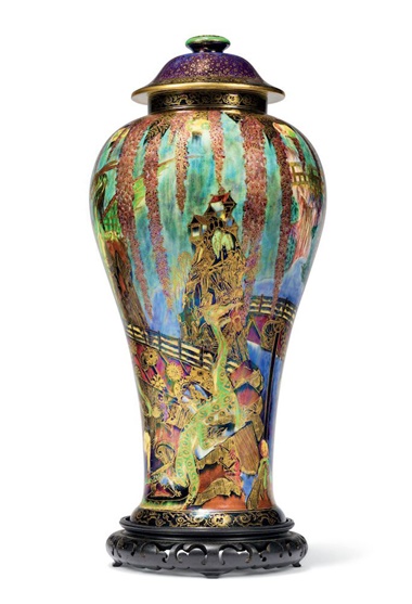A large Wedgwood fairyland lustre Temple on a Rock vase and cover, circa 1925. 20¼  in (51.5  cm) high overall. Sold for £25,000 on 19 May 2021 at Christie’s in London