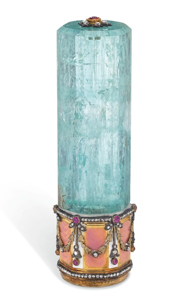 A jewelled and guilloché enamel two-colour gold-mounted aquamarine cane handle marked Fabergé. 3⅝ in (9 cm) high. Estimate £10,000-15,000. Offered in Russian Art on 7 June 2021 at Christie’s in London
