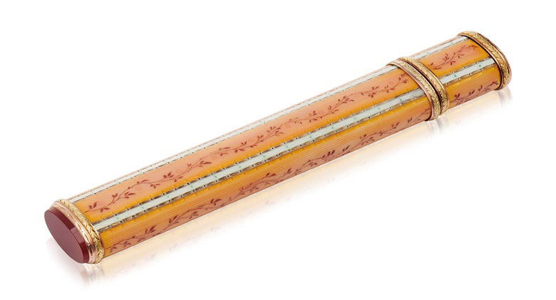 A two-colour gold-mounted guilloché enamel and carnelian sealing wax case by Fabergé, 1899-1903. 5⅝ in (14.4 cm) long. Estimate £8,000-12,000. Offered in Russian Art on 7 June 2021 at Christie’s in London