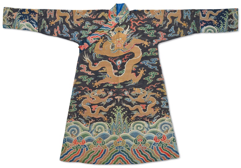 An imperial blackish-blue satin brocade robe, chuba, the brocade, Kangxi period (1662-1722). 55½ in (141 cm) long. Estimate $15,000-25,000. Offered in Important Chinese Ceramics and Works of Art on 23-24 September at Christie’s in New York