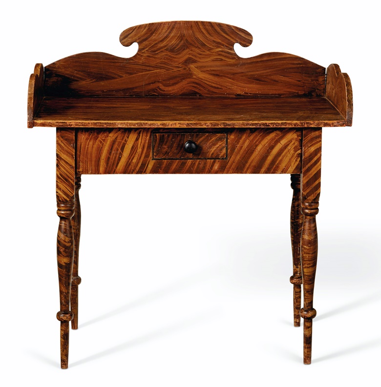 A grain-painted pine Federal dressing table, Maine or New Hampshire, early 19th century. 37 in high, 35½ in wide, 20¼ in deep. Sold for $5,625 on 22 January 2021 at Christie’s in New York