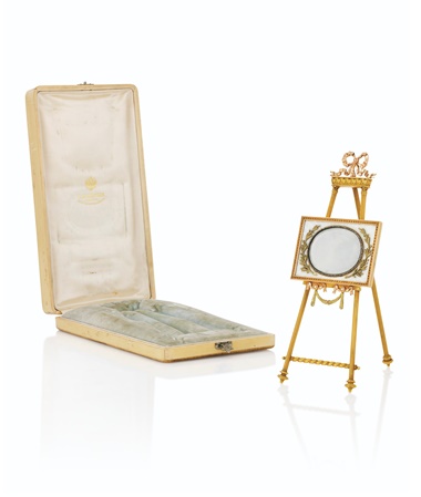 A jewelled and guilloché enamel three-colour gold photograph frame, by Fabergé, Moscow, 1899-1908. 6 in (15.2 cm) high. Sold for £137,500 on 29 November 2021 at Christie’s in London