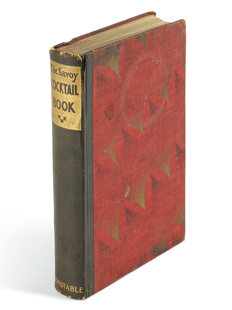 The book’s cover bears a single ring-mark from the base of a martini glass