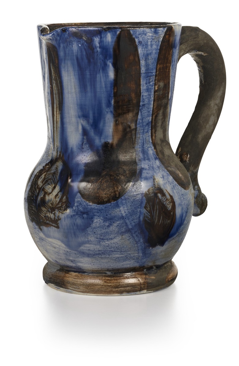 Pablo Picasso (1881-1973), Pichet bleu et brun, 1954. White earthenware ceramic pitcher with coloured engobe and glaze. Height 9  in (22.9  cm). Estimate $30,000-40,000. Offered in Picasso Ceramics Online on 1-15 November 2021 at Christie’s Online
