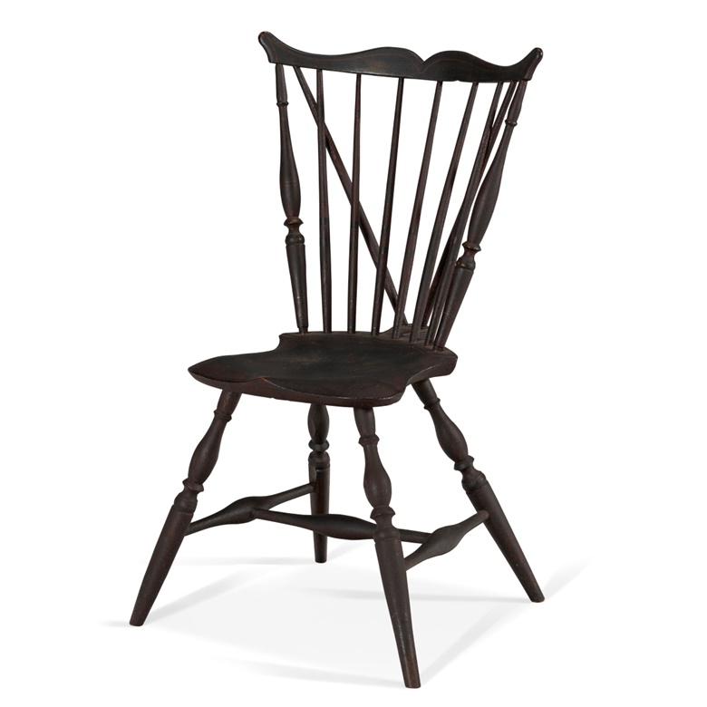 A black-painted maple fan-back brace-back Windsor side chair, Southwestern Rhode Island, 1785-1795. 35½ in (90cm) high. Estimate $20,000-30,000. Offered in The Collection of Peter and Barbara Goodman on 20 January 2022 at Christie’s in New York