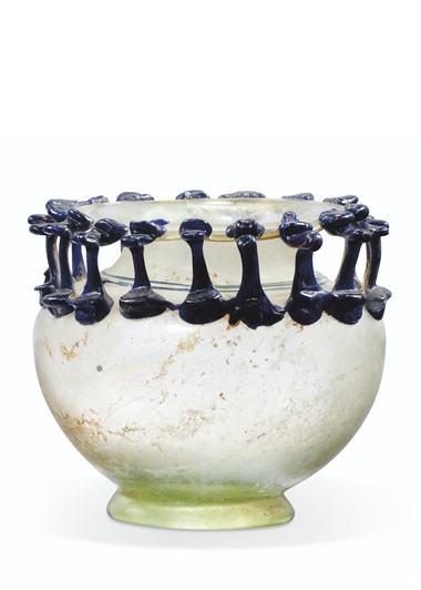 A late Roman glass jar, circa 4th-5th century AD. 3½ in (9 cm) high. Sold for £16,250 on 8 December 2021 at Christie’s in London