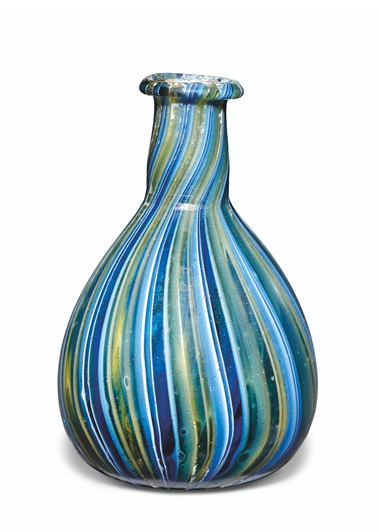 A Roman colour-band mosaic blue glass bottle, circa early to mid-1st century AD. 3½ in (8.8 cm) high. Sold for £21,250 on 7 July 2021 at Christie’s in London