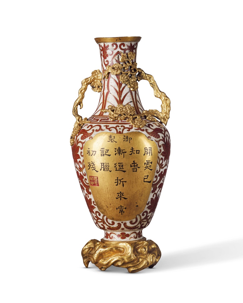 An imperial inscribed cloisonne enamel 'prunus' wall vase. Qianlong period (1736-1795). 10½in (26.5 cm) high. Sold for HKD 819,000 on 30 May 2022 at Christie's in Hong Kong