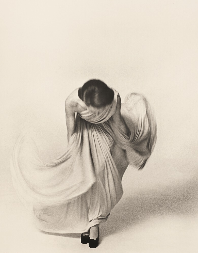 Louis Faurer (1916-2001), Bowing for the Vogue Collections, Paris, 1972, for French Vogue, March 1973. Number 9 from an edition of 20. Gelatin silver print. 15¾ x 11⅘ in (40 x 30 cm). Estimate €10,000-15,000. Offered in Fashion Photographs from the Susanne von Meiss Collection, 12-24 May, online