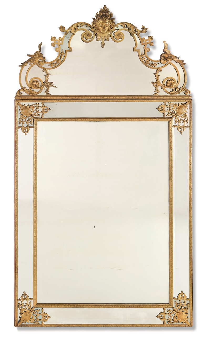 Attributed to Charles Cressent, Régence ormolu-mounted mirror, c. 1720. Bronze, gold and gold plated wood. 294 (115 3⁄4 in.) x 162 cm. (63 3⁄4 in.). Estimate €700,000-1,000,000. Offered in Le Grand Style An apartment on the Quai dOrsay designed by Alberto Pinto, 30 June at Christies Paris.