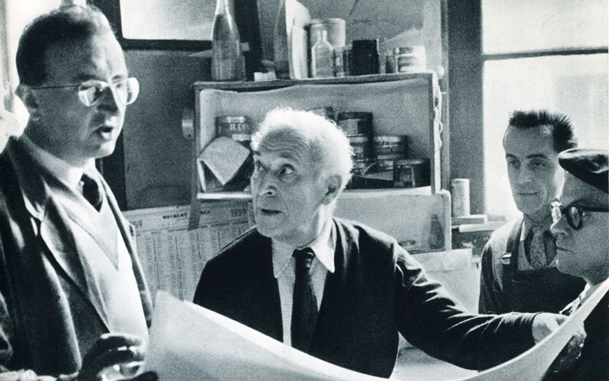 Marc Chagall (centre) at the lithography studio Imprimerie Mourlot, with Charles Sorlier (left), Jojo Sagourin and Maurice Mourlot. Paris, late 1950s. Photo Courtesy of The Mourlot Collection