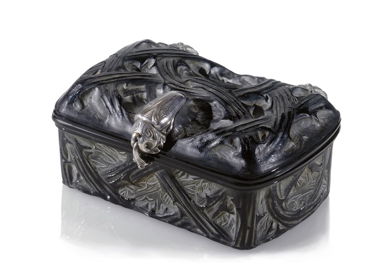 René Lalique (1860-1945), an ‘Epines’ black glass box with white patina, model introduced 1911. 7½ in (19 cm) wide. Sold for $134,500 on 13 June 2008 at Christie’s in New York