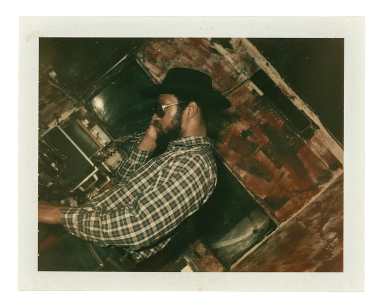 DJ Kool Herc at Railroad Club in The Bronx, New York, mid-1980s. Unique Polaroid print enclosed in commercial envelope. 3 ¾ x 2 ⅞ in. (9.8 x 7.3 cm.). Estimate $700-900. Offered in DJ Kool Herc & the Birth of Hip-Hop from 4-18 August 2022 at Christies Online