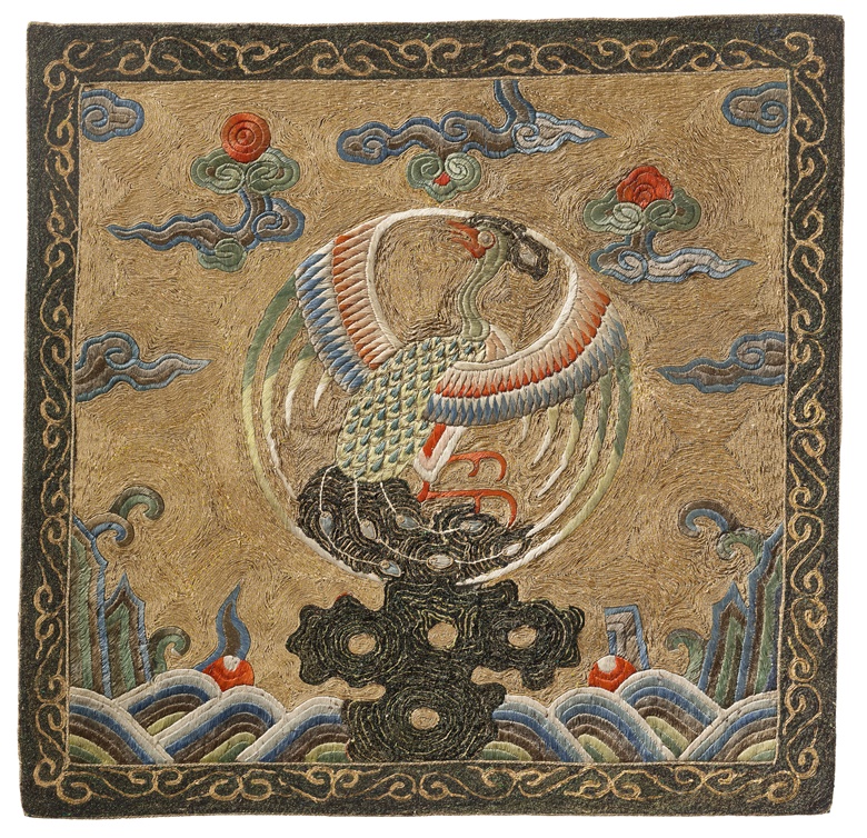 A rare and finely embroidered gold-ground rank badge of a peacock, buzi, Kangxi period (1662-1722). 11⅝ X 12 in (29.5 x 30.3 cm). Estimate $20,000-30,000. Offered in Important Chinese Ceramics and Works of Art from 22-23 September 2022 at Christies in New York