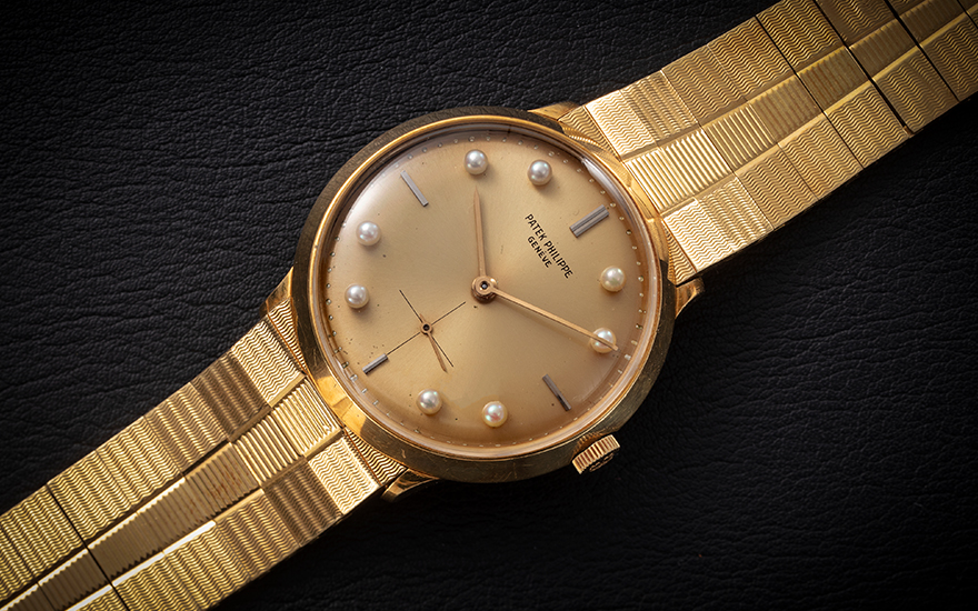 Patek Philippe, Calatrava, ref. 2573 ‘Pearl of the Gulf’. A very rare and impressive gold wristwatch with pearl hour markers. Diameter 33 mm. Sold for $214,200 on 26 October 2022, Online