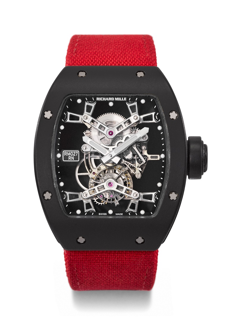 Richard Mille. An extremely important ultra-lightweight carbon composite tourbillon wristwatch with box, ref. RM027 AK-CA, prototype, circa 2010. Case 39 mm wide, 48 mm overall length. Sold for CHF 1,108,800 on 6 November 2022 at Christie’s in Geneva