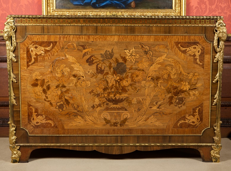 A commode incorporating reworked 17th-century marquetry with ormolu mounts. One of a pair made for the Earl of Exeter. William Ince and John Mayhew, 1767. Photo courtesy Burghley House