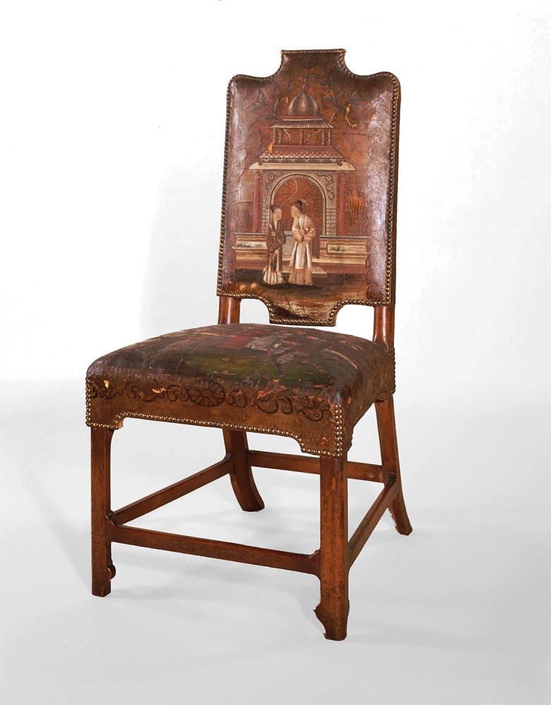 An early-18th-century walnut and beech chair, one of seven re-upholstered and covered with gilded and painted leather for Sir Cecil Bisshopp. William Ince and John Mayhew, 1781. Photo courtesy Lady Lever Art Gallery